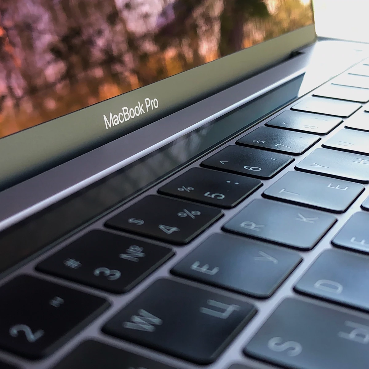 Close-up of a MacBook Pro keyboard and display