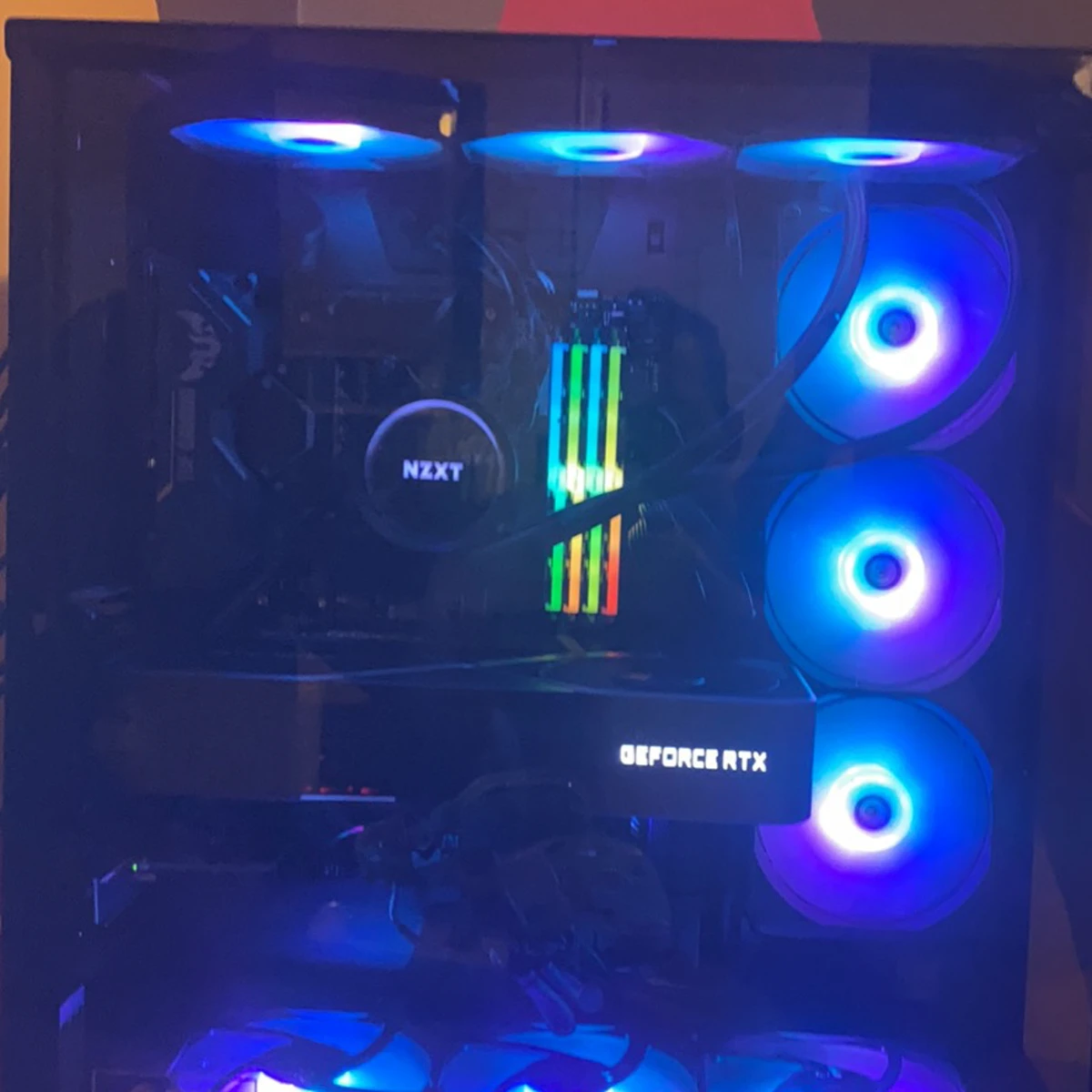 Open PC case with illuminated storage and components