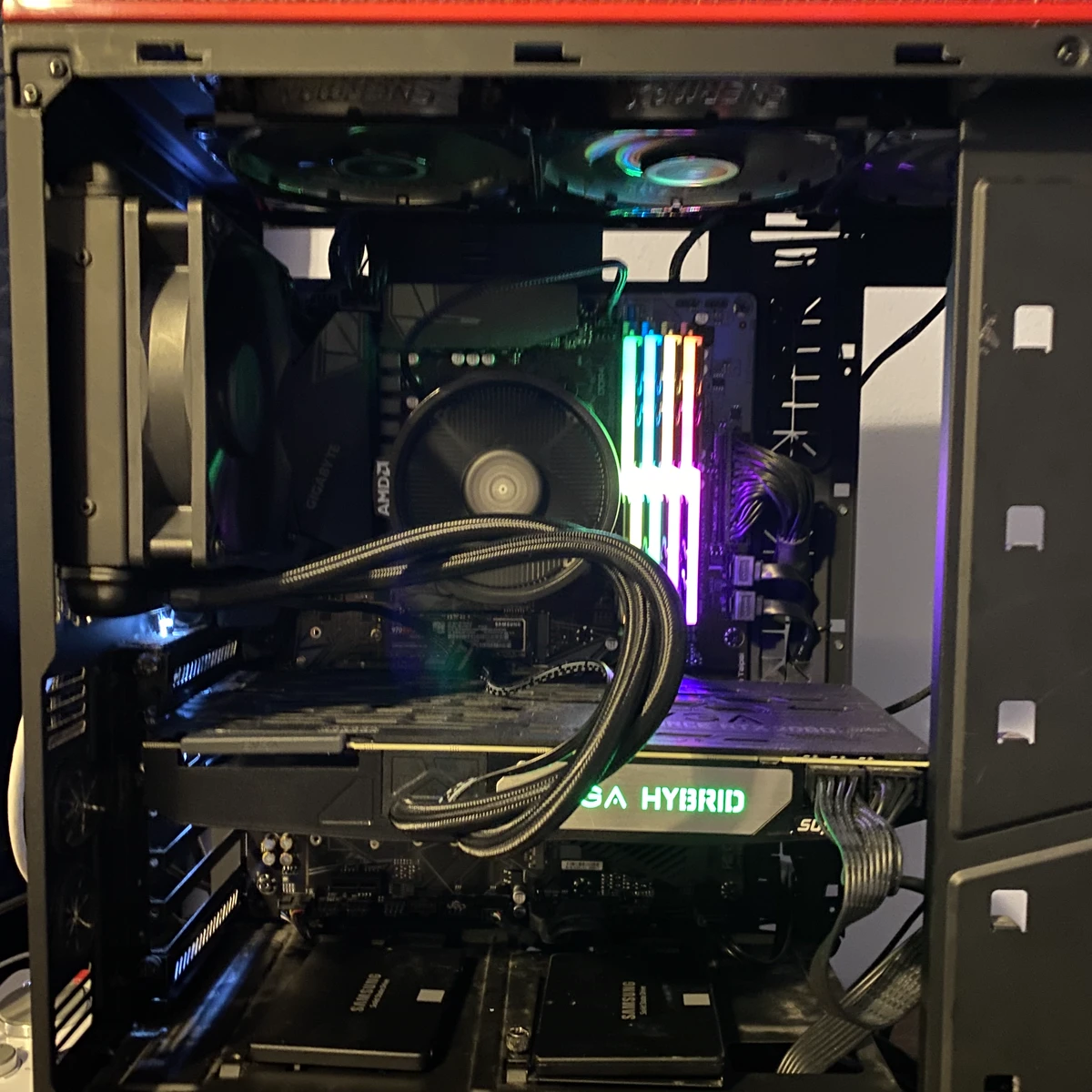 Custom PC build interior with RGB memory and liquid cooling